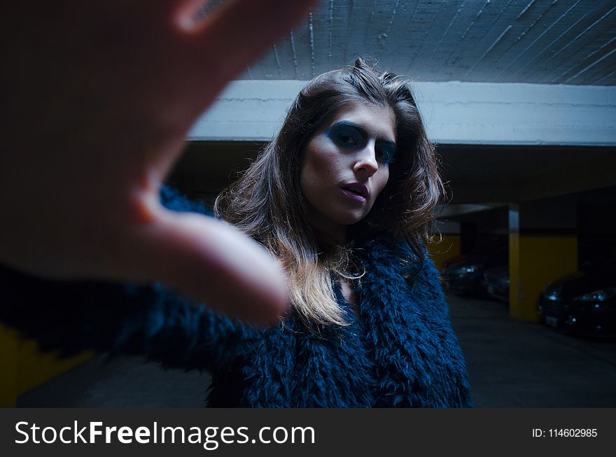 Woman In Blue Fur Top