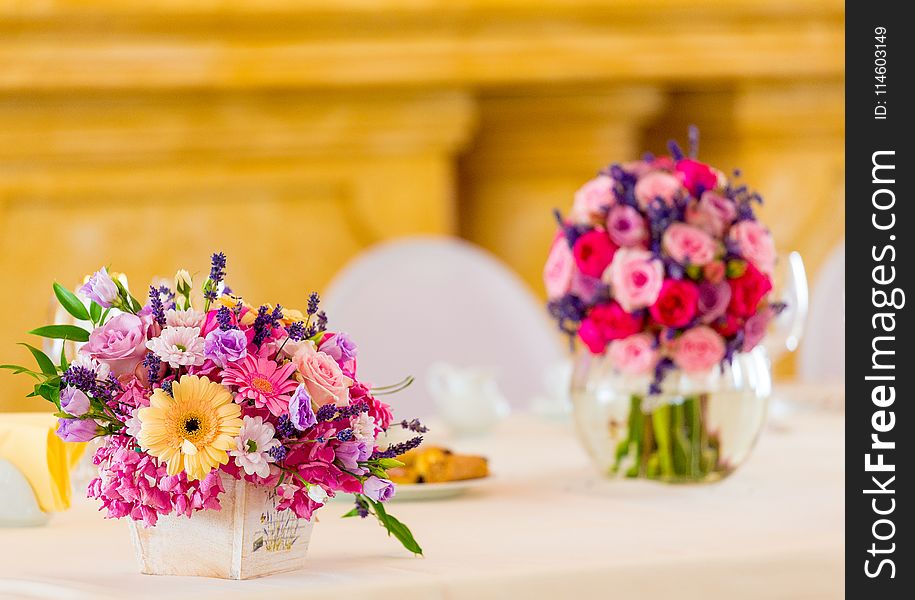 Assorted-color Flowers on White Ceramic Vase