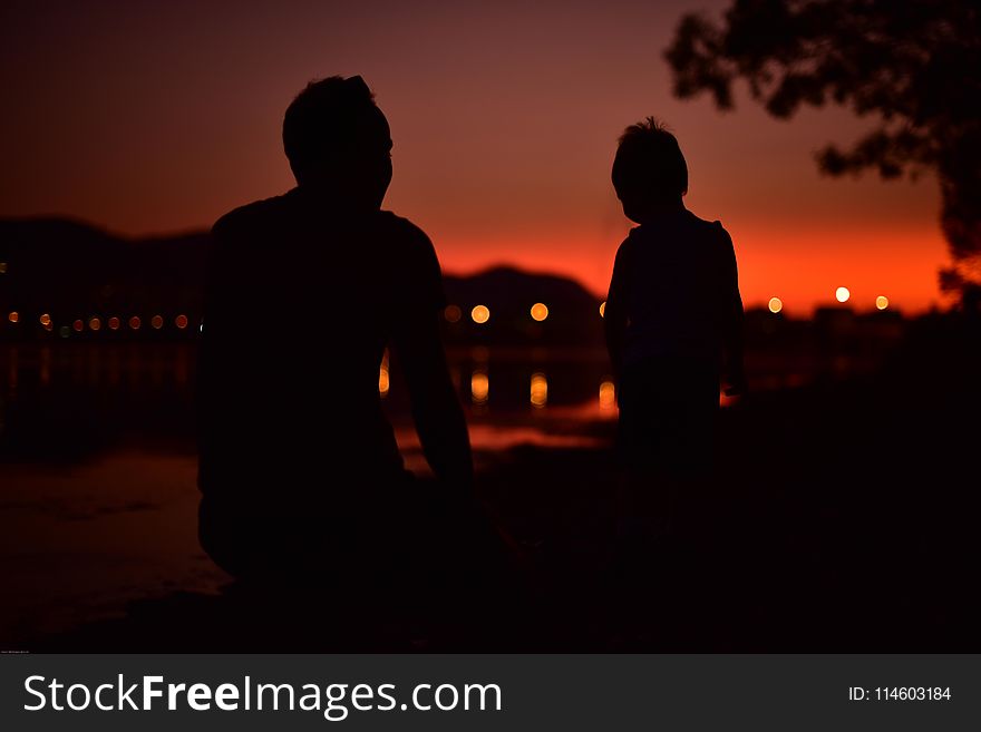 Silhouette of Two People