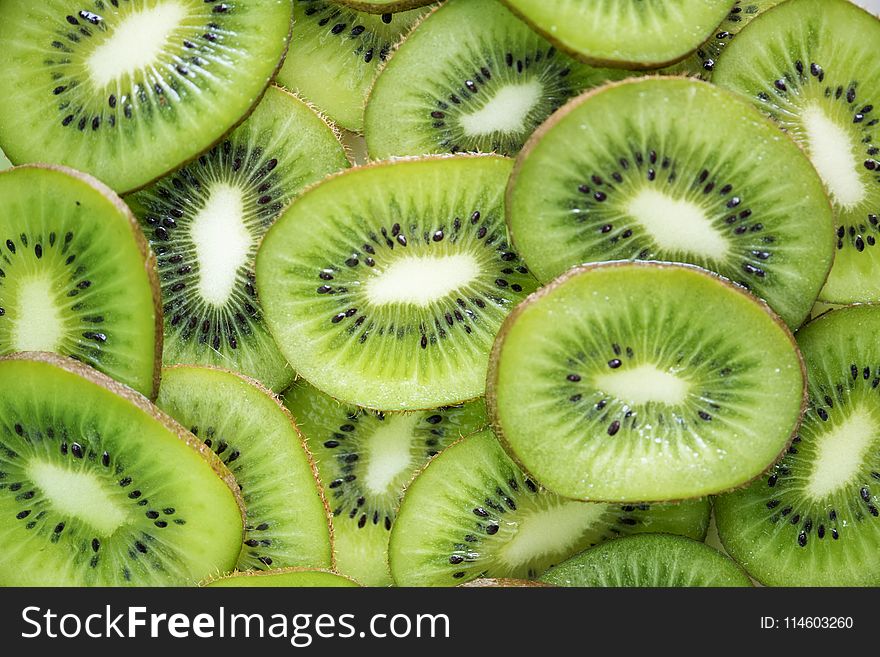Close-Up Photography of Sliced Kiwi Fruits