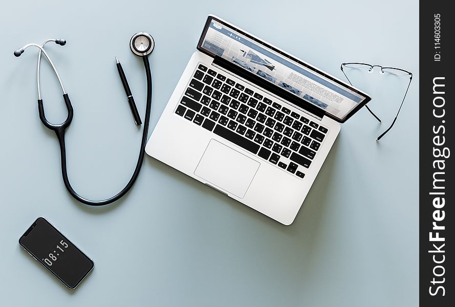 Stethoscope, Pen, Iphone, Macbook, and Sunglasses