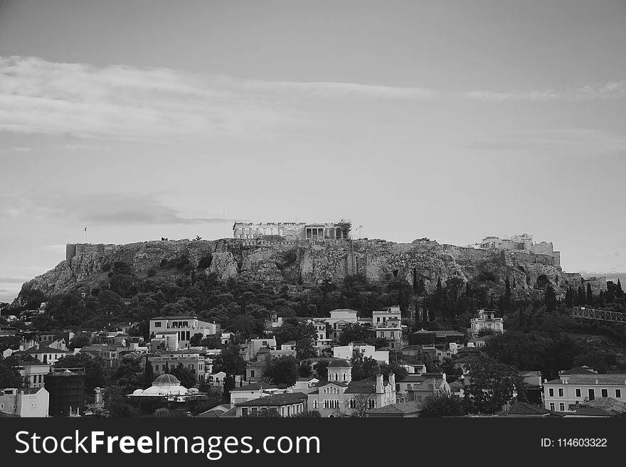 Grayscale Photo of City Buildings