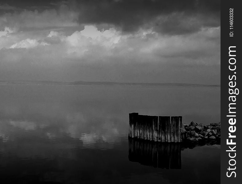 Grayscale Photo Of Body Of Water