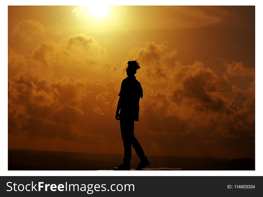 Silhouette of Man During Sunset