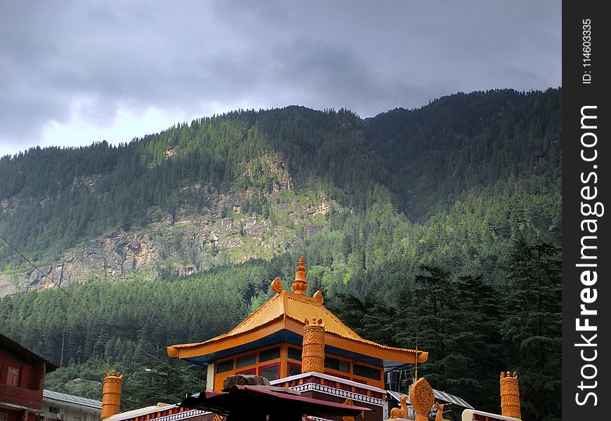 Temple Under Green Forest Mountain