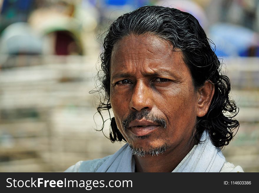 Man In White Collared Top