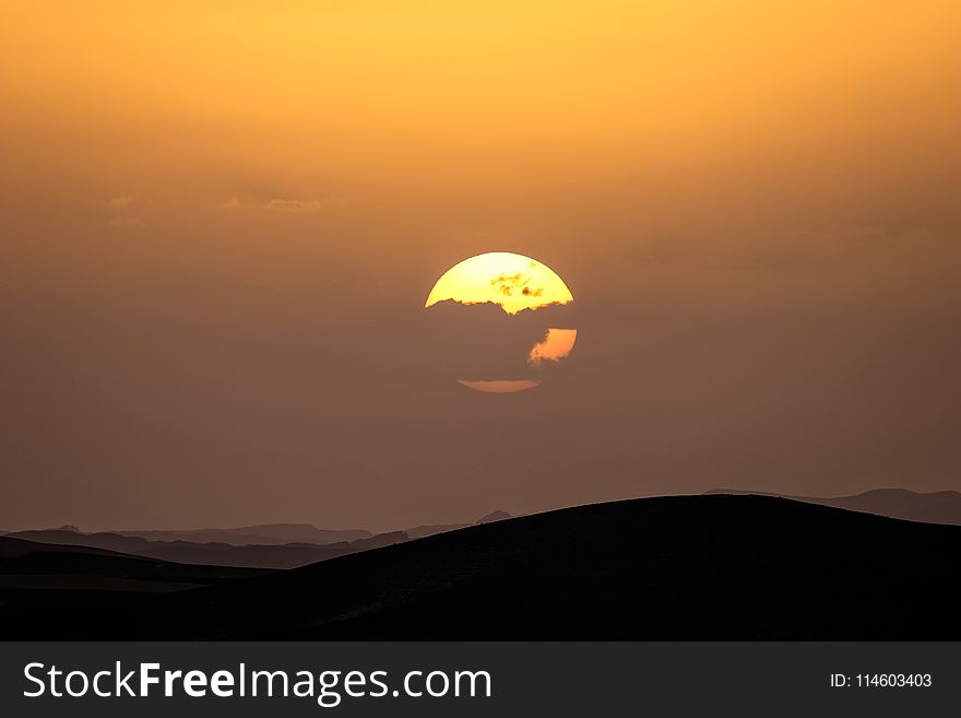 Landscape Photography Silhouette of Hills during Golden Time