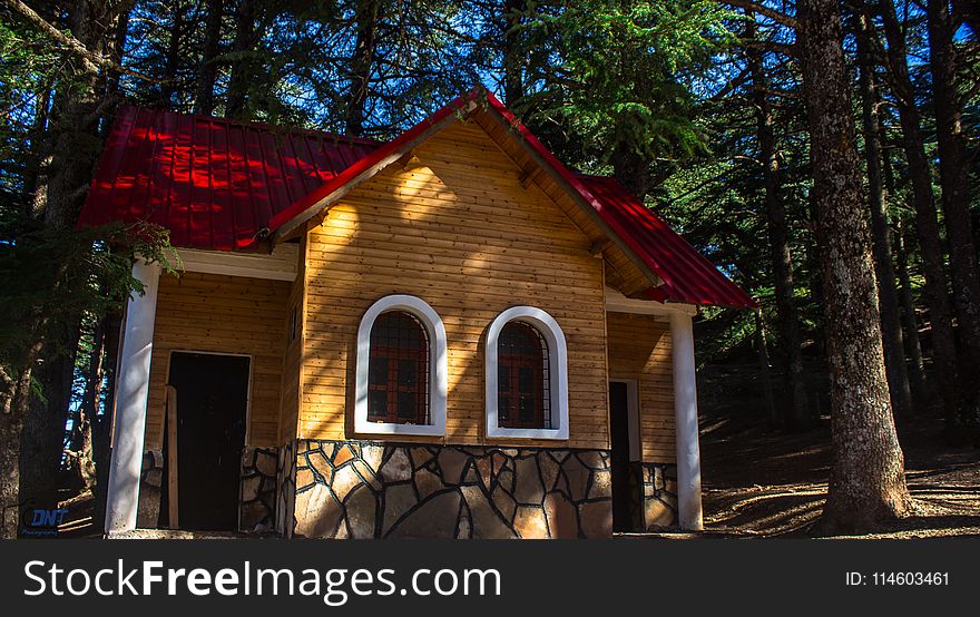 Yellow And Red Painted Wooden House