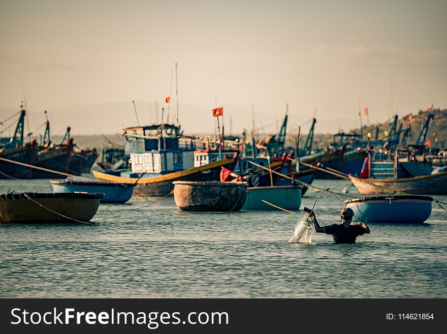 Beautiful Royalty free stock photo. a fisherman in the water in vietnam