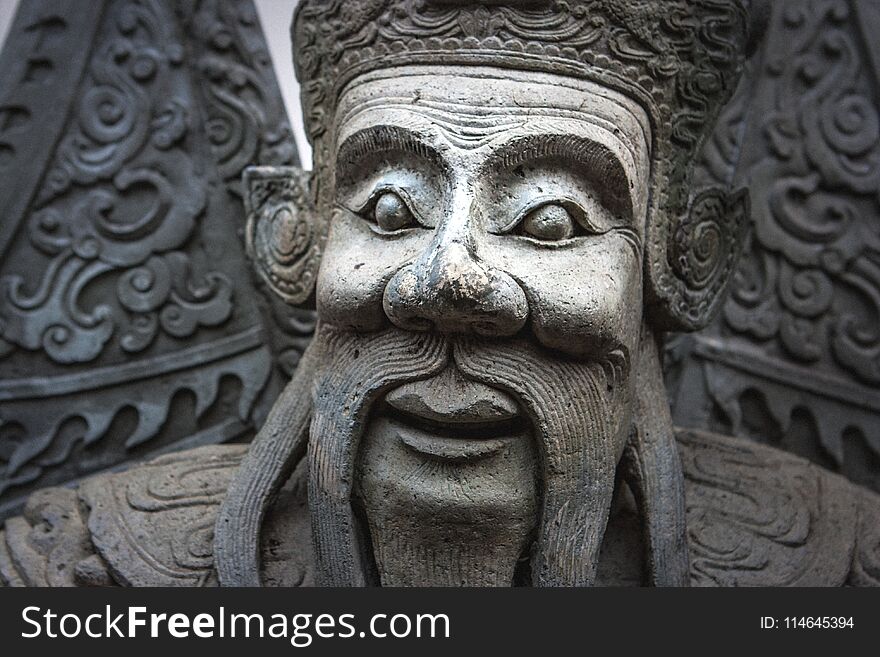 Chinese stone statue at the Wat Pho Temple, Bangkok, Thailand