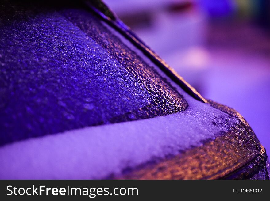 Vehicle covered in ice during freezing rain