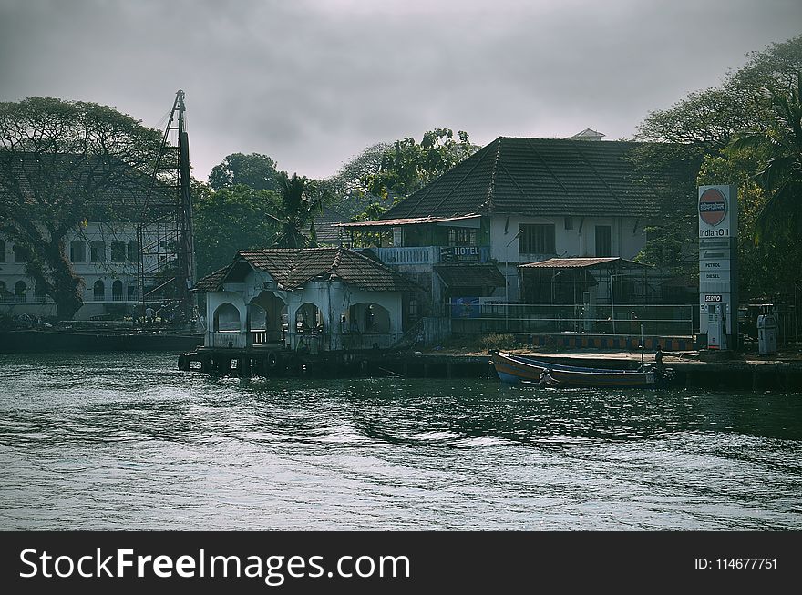 Village Near Body Of Water