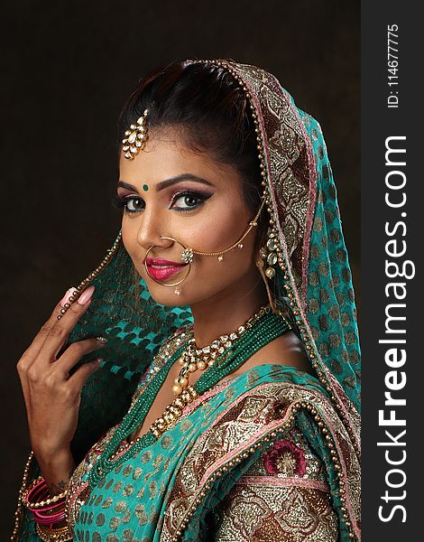 Woman Wearing Green, Brown, And Pink Sari Dress Portrait Photograph