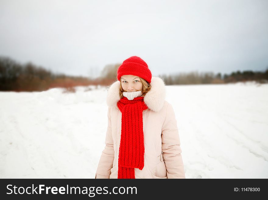 Girl in red hat and scarf