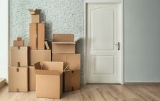 Cardboard Boxes On Floor Stock Images