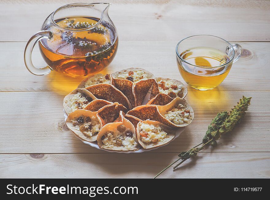 Moroccan pancakes with herbal tea. Middle Eastern food.