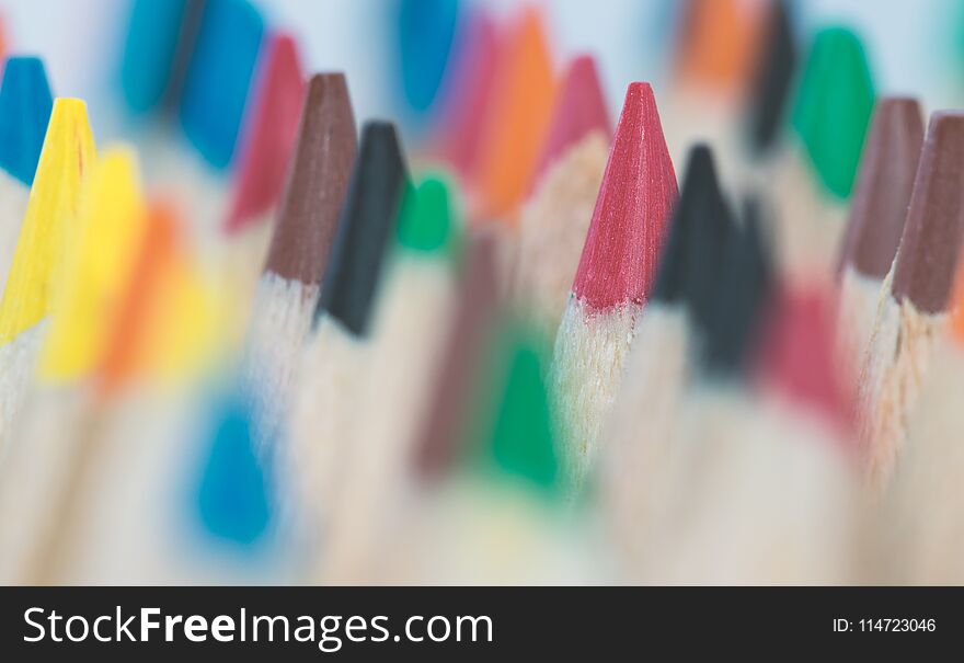 Close up of a pencil colors on a white background.