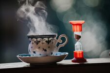 Elegant Tea Cup And Hourglass Stand Shelf Royalty Free Stock Images