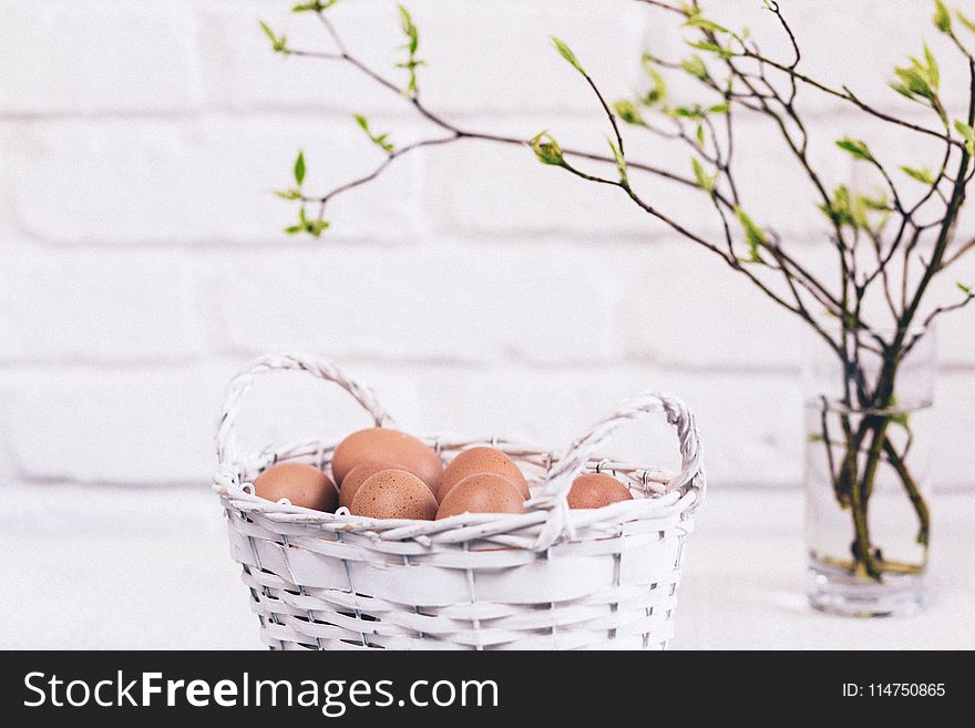 Bunch of Poultry Egg in White Wicker Basket