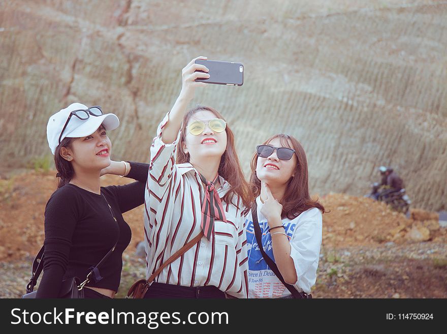 Three Woman Doing Some Selfie