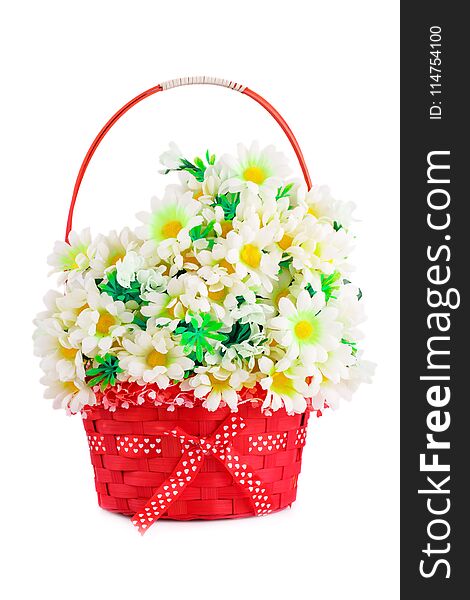 Fabric daisies in wicker basket isolated on white background. Fabric daisies in wicker basket isolated on white background.