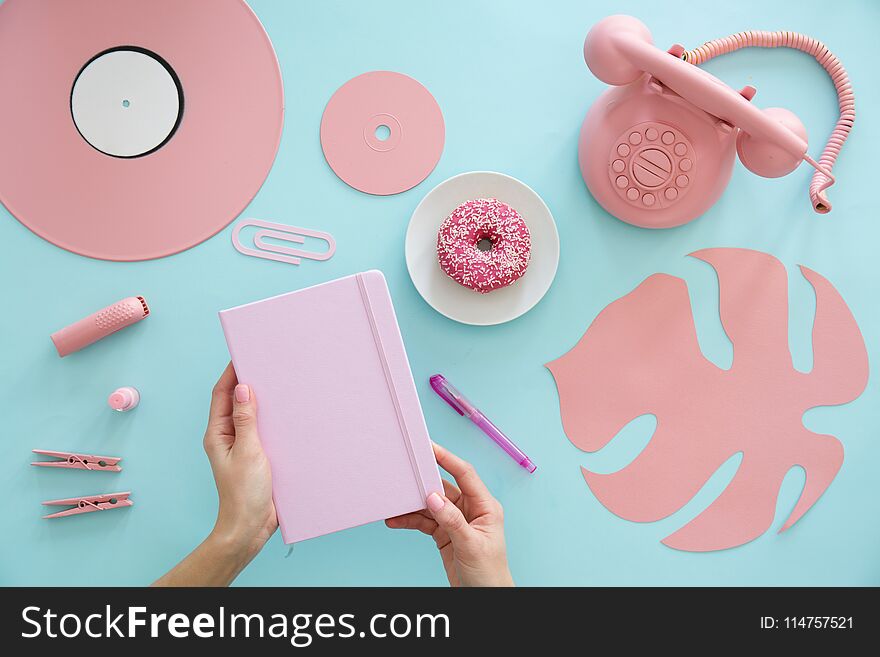 Freelancer With Pink Notebook