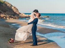 Bride And Groom At Wedding Ceremony Near Sea Outdoors Stock Photography