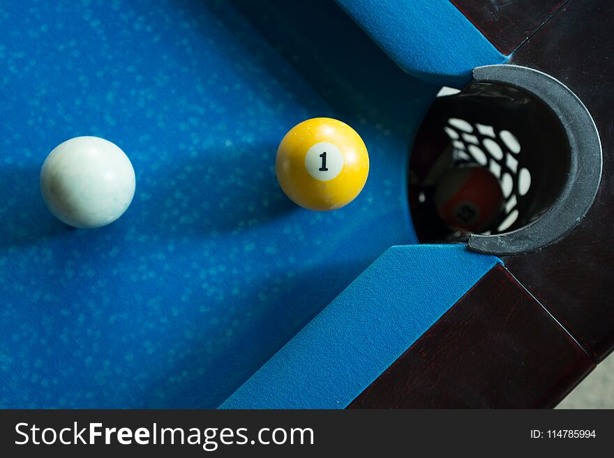 Sport billiard balls on blue billiard table