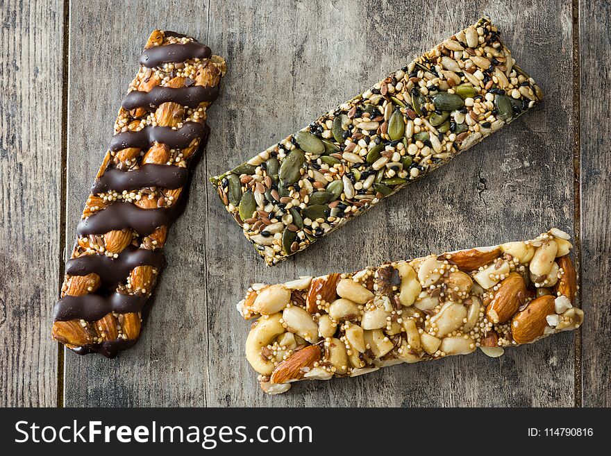 Muesli Bars On Wooden Table.