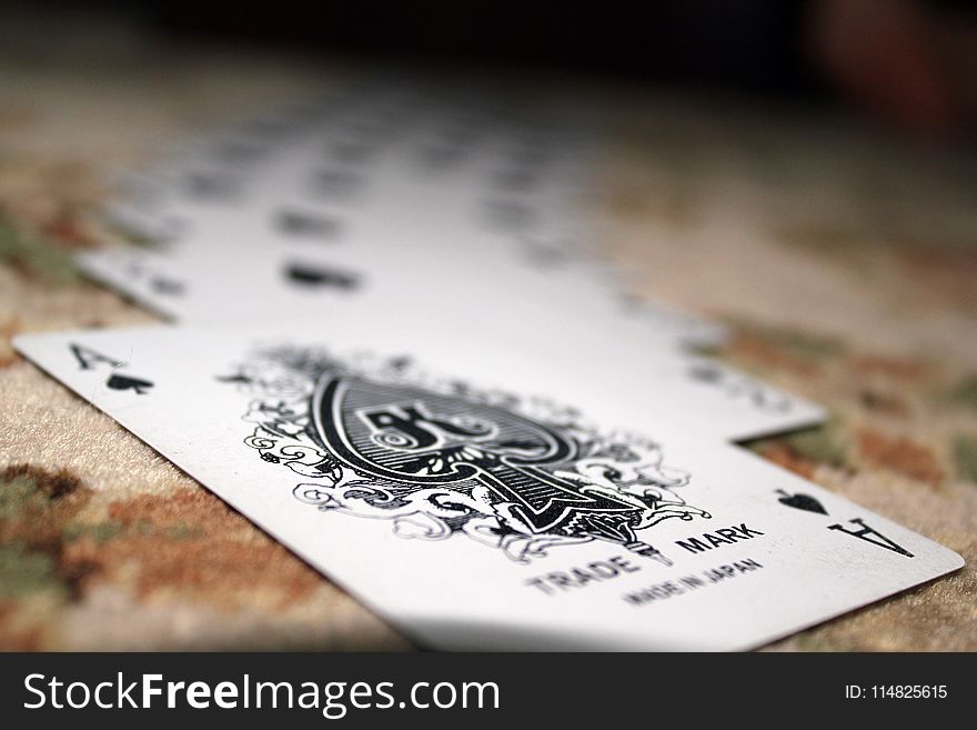 Selective Focus Photography of Ace of Spade Playing Card