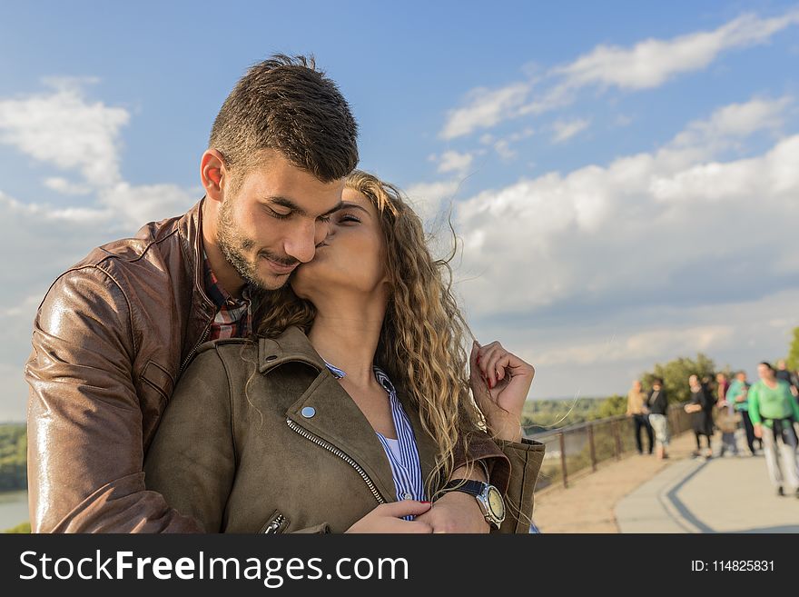 Woman Kissing Man