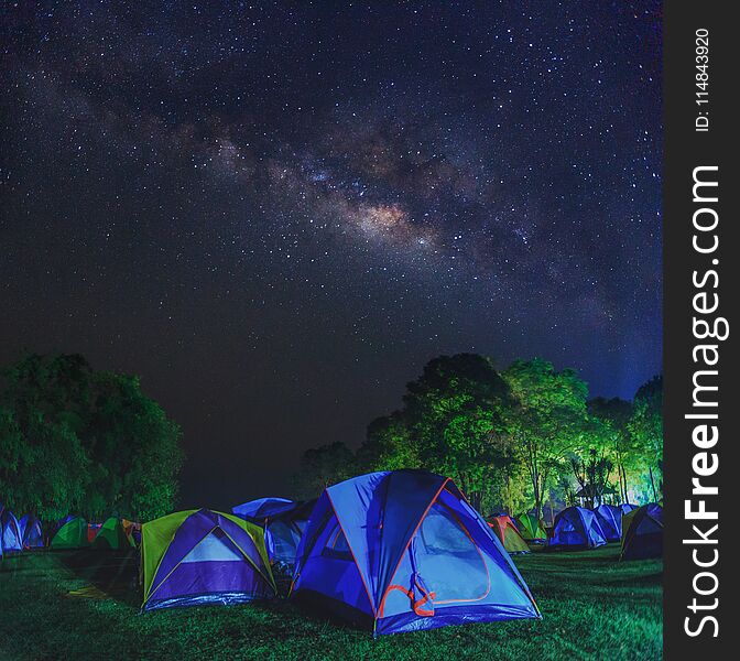 Landscape Panorama Milky way at Huay Mae Kamin Waterfall in rainforest at Kanchanaburi, Thailand.