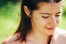 Happy Cute Woman Smiling In Sunlight On Background Of Green Nature In Mountains In Summer Stock Photo Happy Cute Woman Smiling In Sunlight On Background Of Green Nature In Mountains In Summer Stock Photo