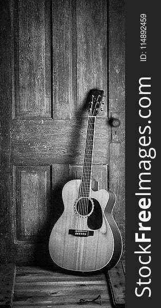 Brown and Black Cut-away Acoustic Guitar