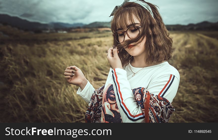 Photo of Woman Sniffing Hair