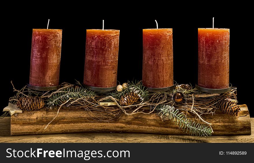 Four Brown Wax Candles