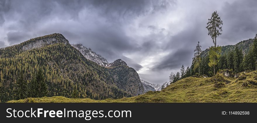 Landscape Photography of Mountains Under Gray Cloudy Sky