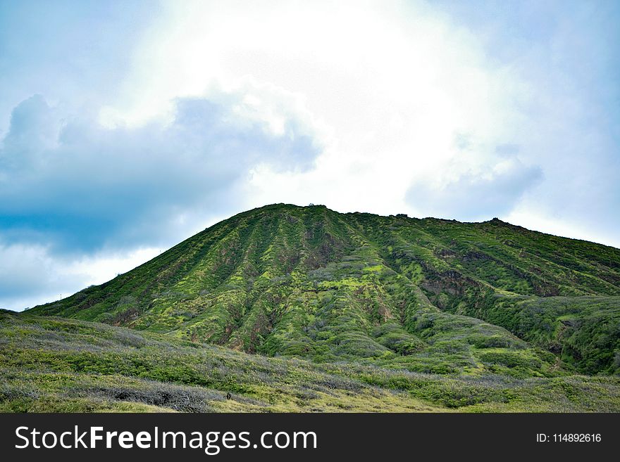 Green Mountain Under White Cloudy Sky