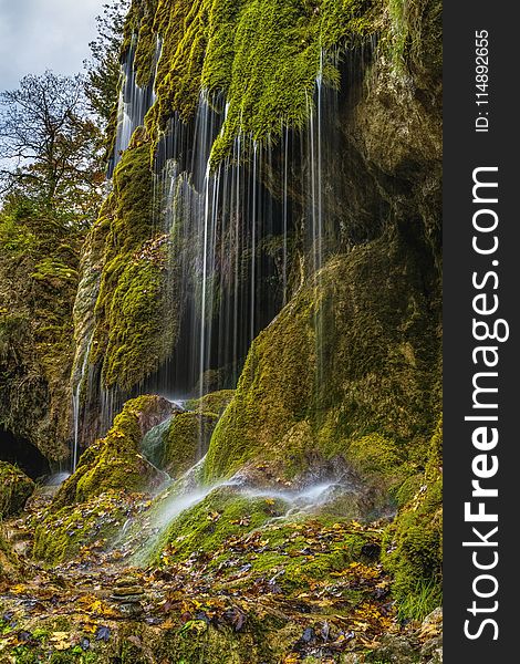 Waterfalls on Mountain Cliff