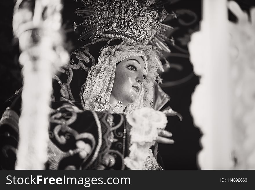 Grayscale Photo of Religious Figurine