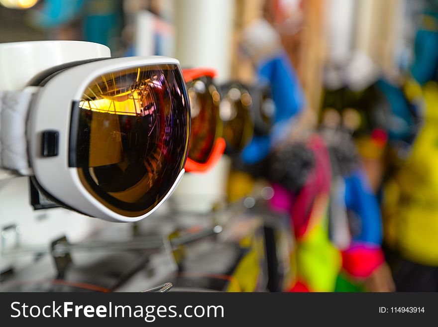Selective Focus Photography of White Framed Sports Sunglasses