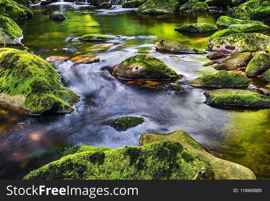 Body of Water With Rocks