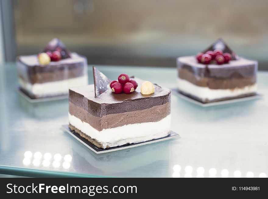 Selective Focus Photo of Sliced Cake on Table