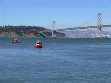 Two Cutters In San Francisco Bay, Bay Bridge In The Background Royalty Free Stock Images Two Cutters In San Francisco Bay, Bay Bridge In The Background Royalty Free Stock Images