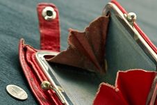 Shabby Purse With Coin Royalty Free Stock Photos