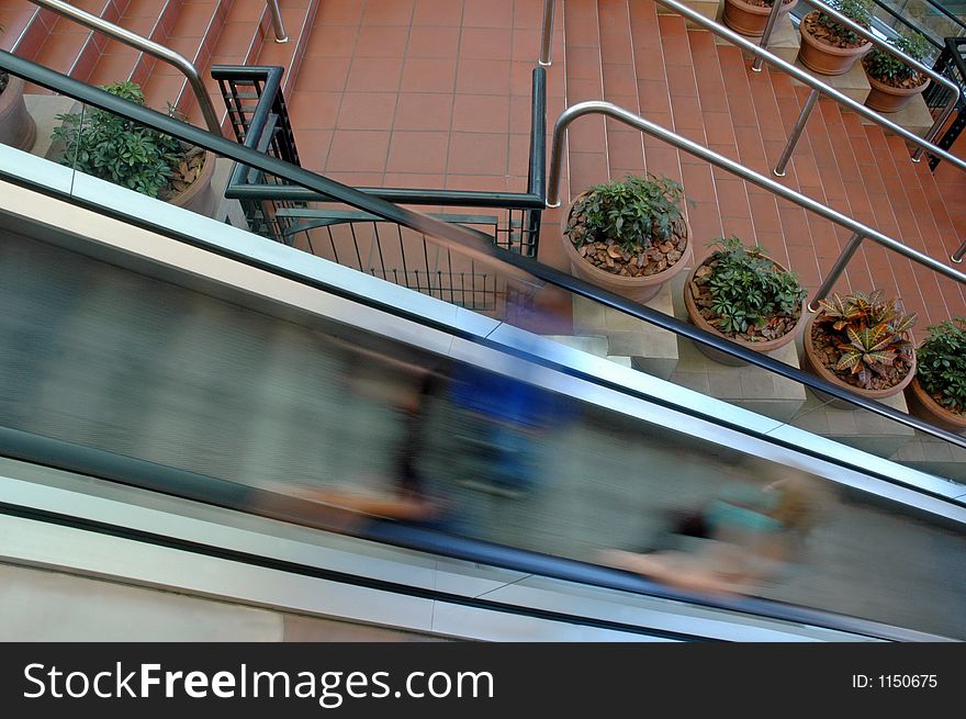 Passing images on an escalator. Passing images on an escalator.