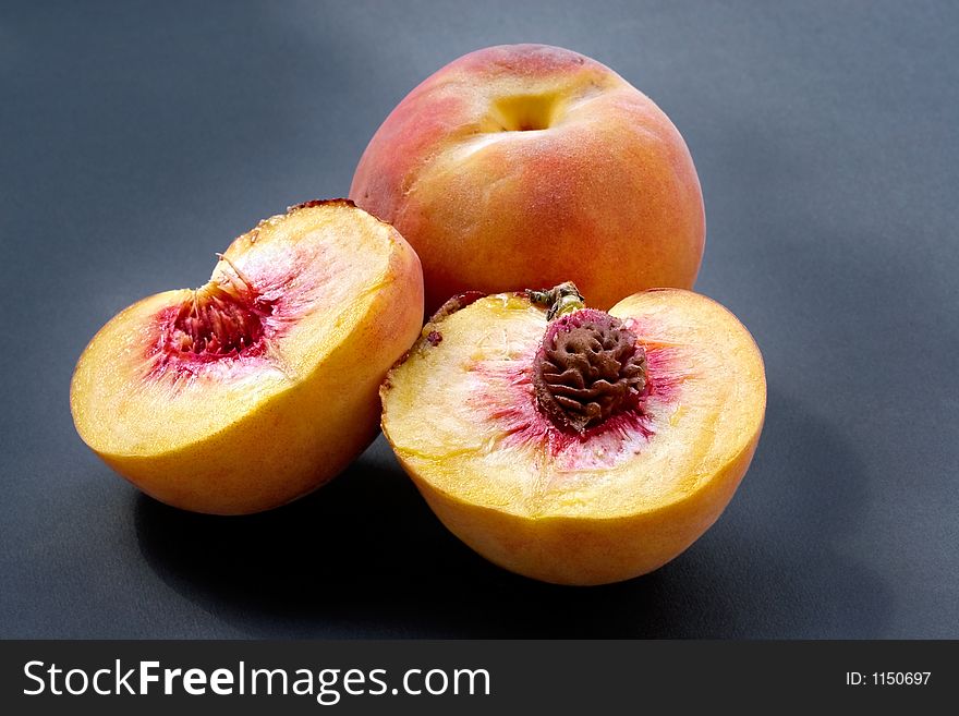 Ripe juicy fleshy cut peaches