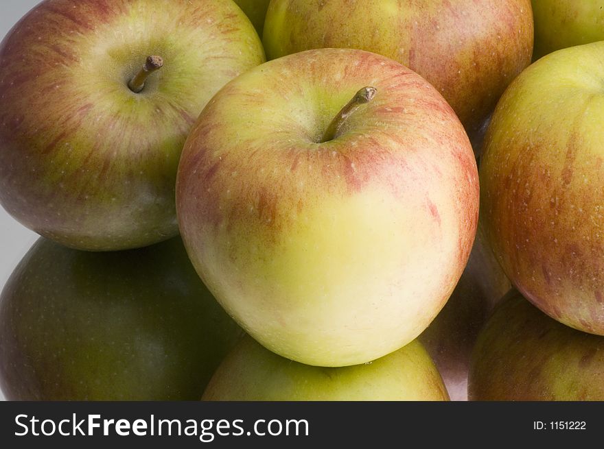 Group of apples on reflective surface. Group of apples on reflective surface