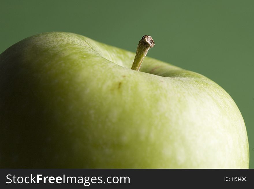 Isolated close up of a green apple