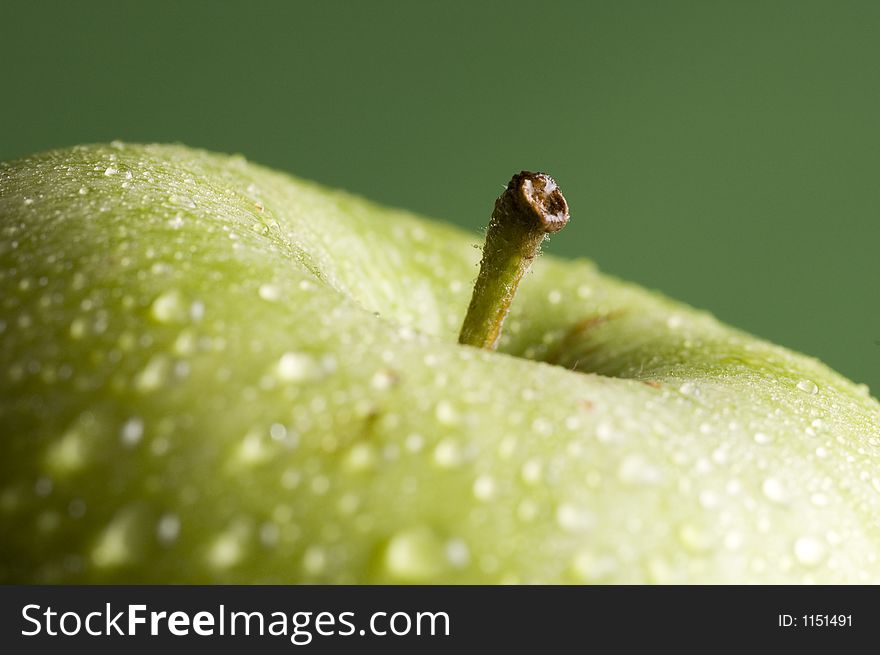 Isolated close up of a green apple